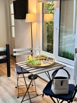 a tray of fruit on a table in a room at Studio n3 Bruxelles Centre Ville in Brussels