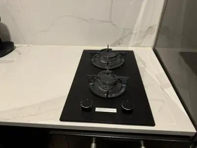 a black stove sitting on top of a counter at Garden loft in city center Meir 1FL in Antwerp