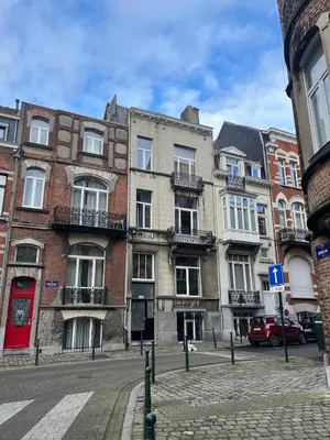 a row of buildings on a city street at European District Apartment Seven in Brussels