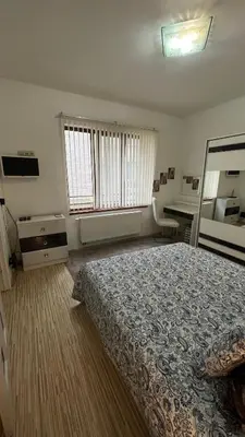 a large bedroom with a bed and a mirror at Two bedroom flat - Hyper Center Brussels in Brussels