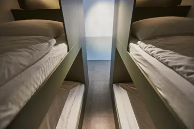 two bunk beds in a room next to each other at Het Kasterhuis in Wetteren