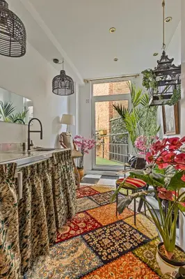 a kitchen with a sink and a counter top at Le Papillon Antwerp Suite 3 in Antwerp