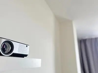 a television sitting on top of a wall at Astrid Sauna Appartement Antwerp in Antwerp