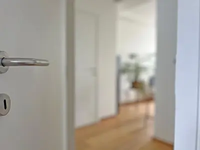 an open door with a hallway in the background at Astrid Sauna Appartement Antwerp in Antwerp