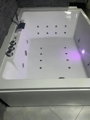 a white stove top oven sitting on top of a counter at Jungle suite romantic - private Jacuzzi - in Brussels
