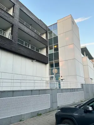 a building with a car parked in front of it at Atomium Brussels Expo Stay in Brussels