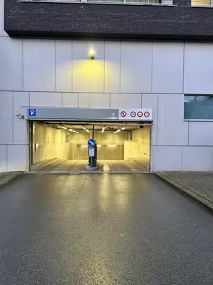 a building entrance to a tunnel with a parking meter at Atomium Brussels Expo Stay in Brussels
