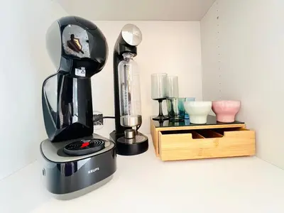 a black blender sitting on top of a counter at Luxurious Escape - Room LoveSerenity with pool and jacuzzi in Brussels