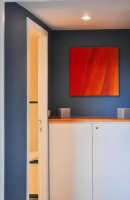 a room with a red painting on the wall at B&B Woluwé in Brussels