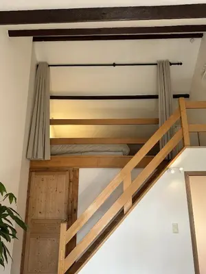 a room with two bunk beds on the ceiling at CasaVerde Family House With Duplex Suite in Ghent