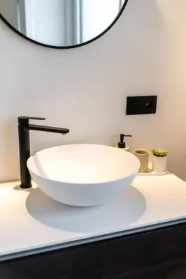 a white bowl sink on a counter in a bathroom at Your Antwerp Adventure Sleeps 4 in Antwerp