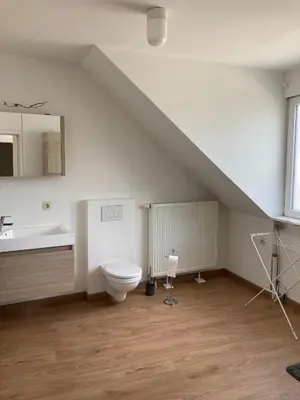 a bathroom with a toilet and a sink at Bright appartement in Zaventem