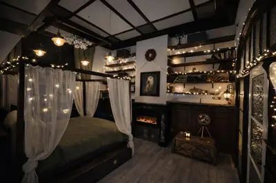 a bedroom with a bed with lights and a fireplace at Magical double bedroom duplex in Brussels
