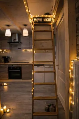a ladder with a movie night sign on it in a kitchen at Magical double bedroom duplex in Brussels