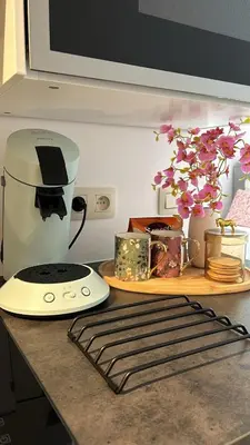 a kitchen counter with a mixer on a counter top at Chez soi in Brussels