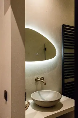 a bathroom with a bowl sink and a mirror at Perfect-Stay in Antwerp