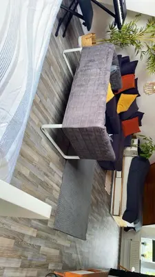 a room with a bunch of pillows on a wall at Cosy place near Atomium with parking in Vilvoorde
