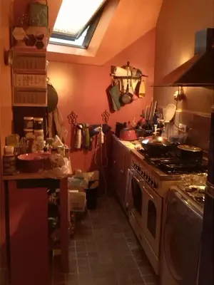 a kitchen with a stove and a stove top oven at Artistic appartment near downtown & railwaystation in Antwerp