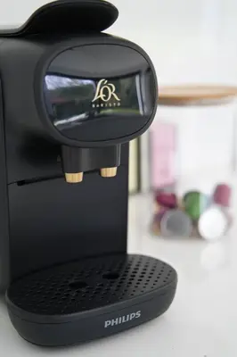 a black coffee maker sitting on top of a counter at Vakantiewoning DRP29 in Zelem