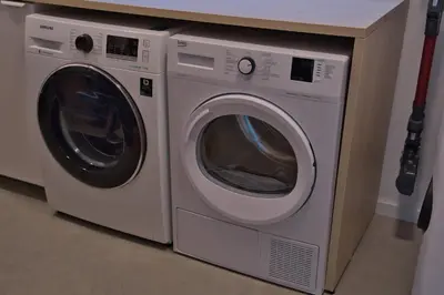 two washing machines are sitting next to each other at Vakantiewoning DRP29 in Zelem