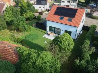 an aerial view of a house with a solar roof at Vakantiewoning DRP29 in Zelem