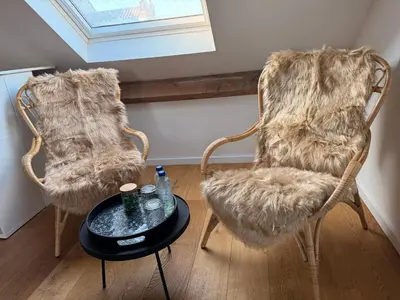 two chairs and a table in a room at BeMe in Waterloo