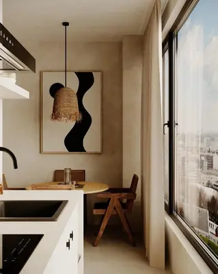 a kitchen with a table and a window at KYOTO SUITES - Antwerp in Antwerp