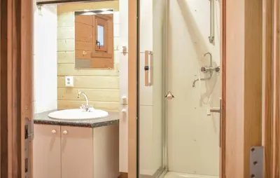 a bathroom with a sink and a shower at Sjapoo in Wachtebeke