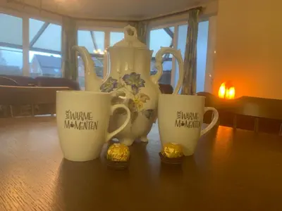 three coffee cups sitting on top of a table at Twisted Willow in Dendermonde