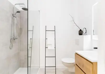 a bathroom with a shower and a toilet and a sink at Charming house in city center in Antwerp