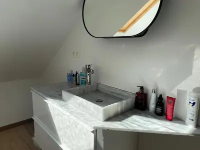 a bathroom with a sink and a mirror at Apartment Antwerp City center #003 in Antwerp
