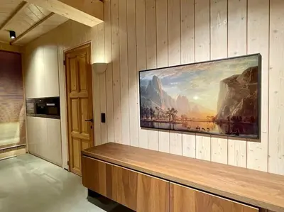 a large painting hanging on a wall in a room at AWolf in a healthy NEW home in Herentals