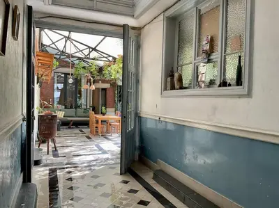 an open door of a building with a patio at Studio Richard in Antwerp