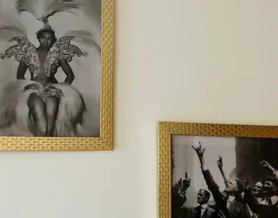 a framed picture of a woman with wings on a wall at Living History - Suikernest in Antwerp