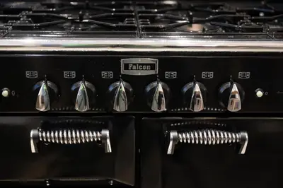 a close up of the control knobs of a stove at Chic 3-BR Oasis in Ghent - Stylish Interiors in Ghent