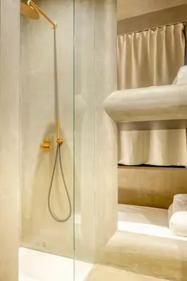 a shower with a glass door in a bathroom at Cozy Ghent Studio for 4 Guests in Ghent