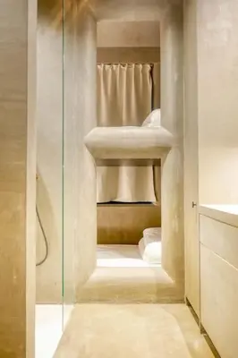 a bathroom with a shower and some towels at Cozy Ghent Studio for 4 Guests in Ghent