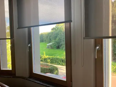 a window with a view of a yard at Nice flat near Brussels in Dilbeek