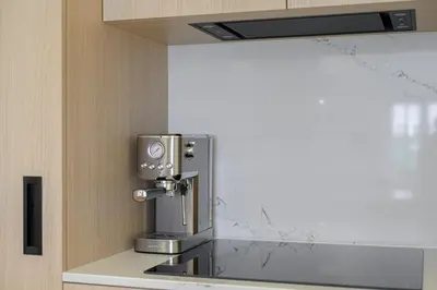 a coffee machine sitting on top of a counter at SHWAY - The Printing Press in Antwerp