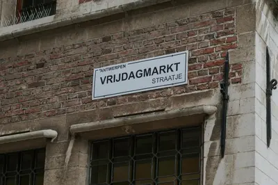 a sign on the side of a brick building at SHWAY - The Printing Press in Antwerp