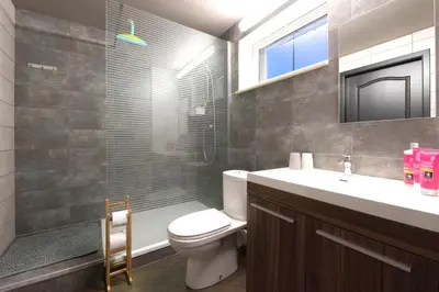 a bathroom with a toilet and a sink and a shower at B&B De Oude Berg in Mol