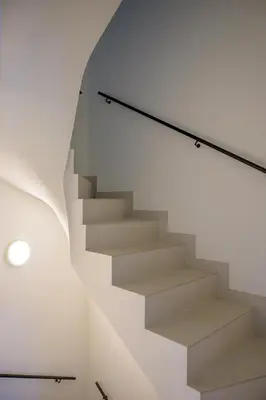 a staircase in a house with a glass wall at SHWAY - The Book Binder in Antwerp
