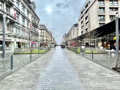 a cobblestone street in a city with buildings at LUX Appartment in BXL Center in Brussels