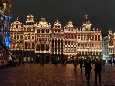 a large building with christmas lights in front of it at LUX Appartment in BXL Center in Brussels
