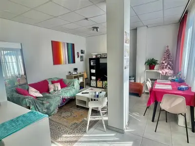 a living room with a couch and a table at LUX Appartment in BXL Center in Brussels