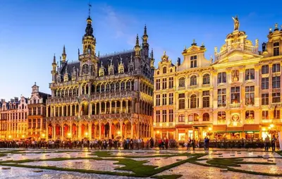 a group of buildings in a city at night at Lisa appartement Brussels in Brussels