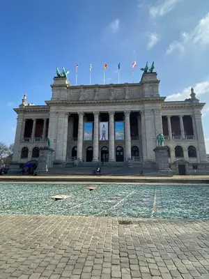 a building with a fountain in front of it at Trendy studio at top location in Antwerp