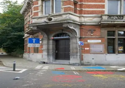 a building with a door on the side of a street at Hip & Historic Stay Antwerp in Antwerp