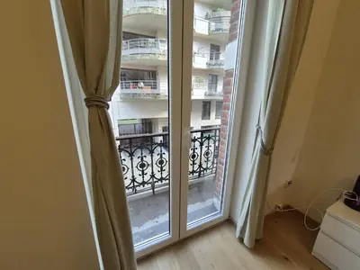 a window with a view of a balcony at Elegant apartment in center of Brussels in Brussels