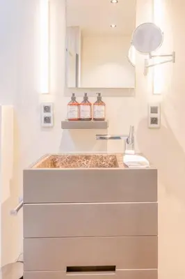 a bathroom with a sink and a counter top at Ideal terraced Studio Retreat in Ghent's Center in Ghent